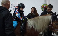 Terapijsko jahanje konja za decu sa hendikepom